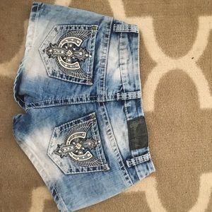 Juniors jean short with gem design on back pocket